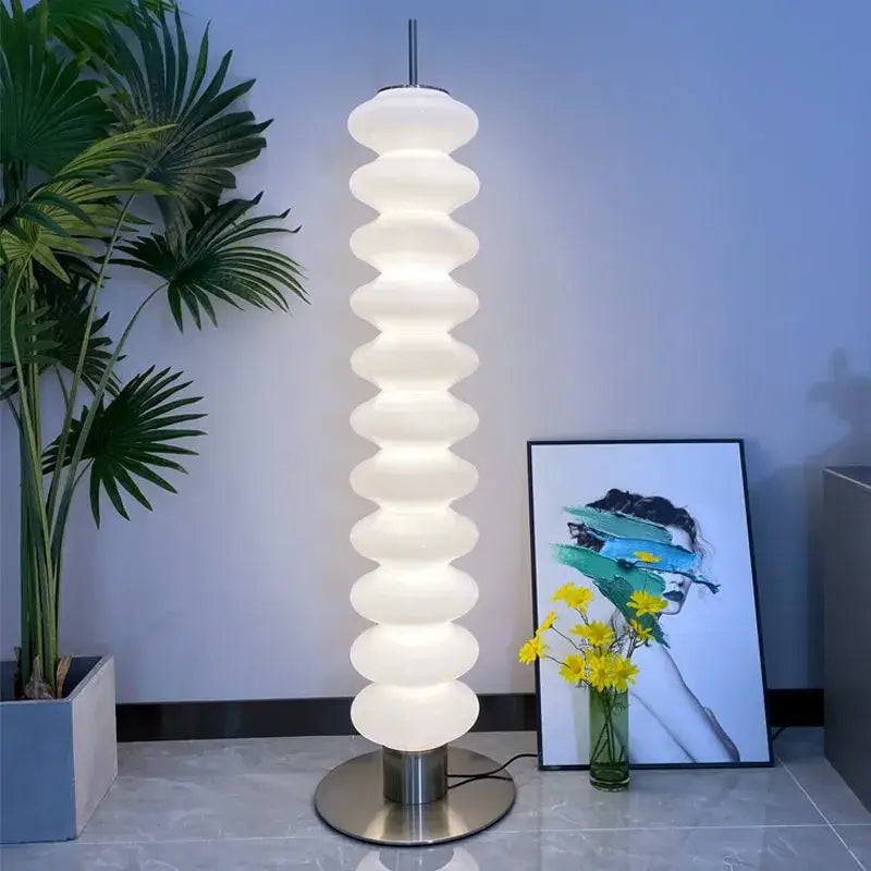 Modern white spiral floor lamp with sleek metallic base from decorbites led gourd sanding for living room and bedroom