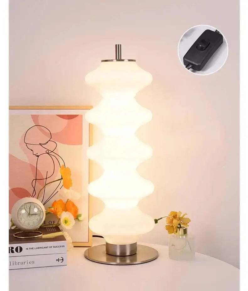 Modern frosted white glass decorbites led gourd sanding floor lamp with segmented wavy design and brushed metal base
