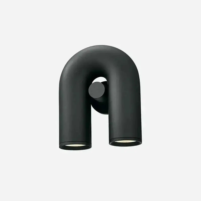 Black matte u-shaped wall sconce reading lamp with two cylindrical LED light fixtures for chic home decor