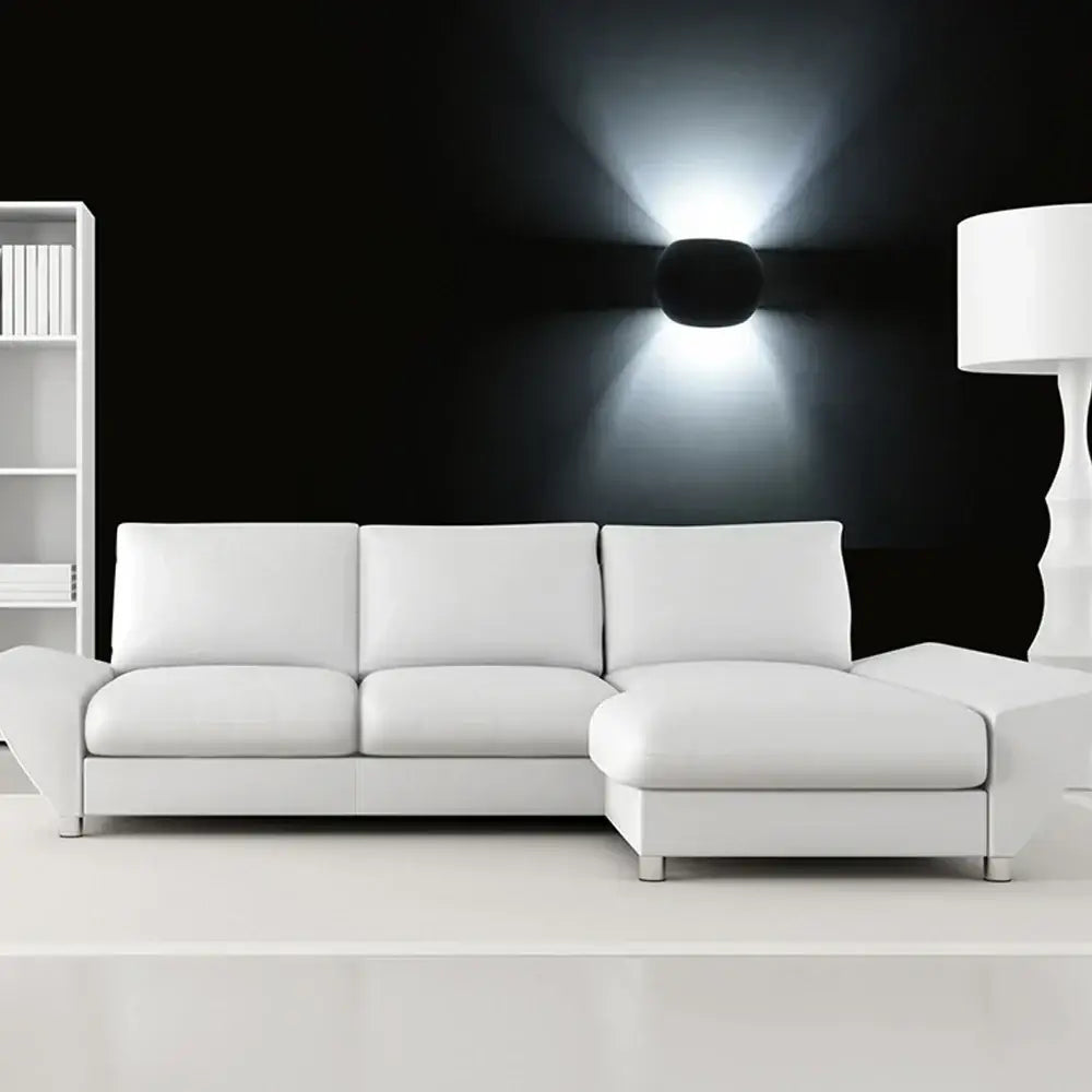 White leather sectional sofa with clean lines beside decorbites led gypsum wall lamp 5w modern indoor sconce