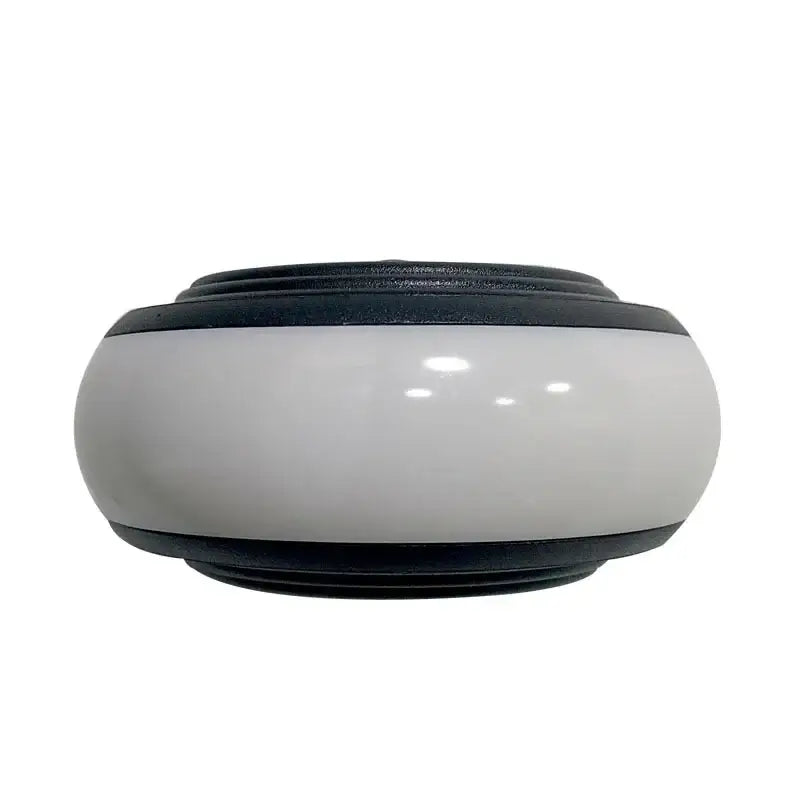 Decorbites led wall sconce with sleek oval white body and black textured bands for staircase and balcony lighting
