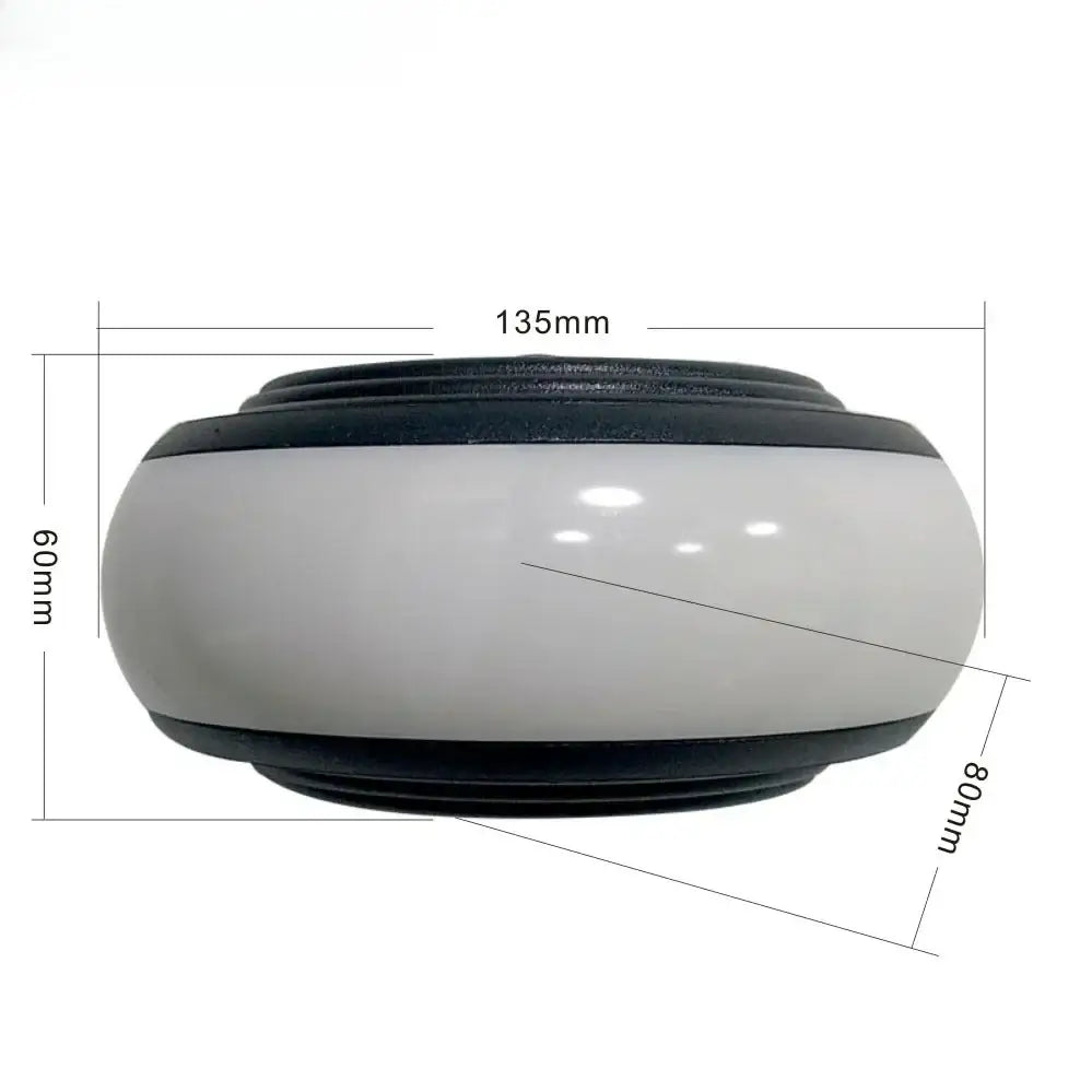 DecorBites™ LED wall sconce with sleek oval white ceramic body and black rubberized bands for staircase lighting wall lamp