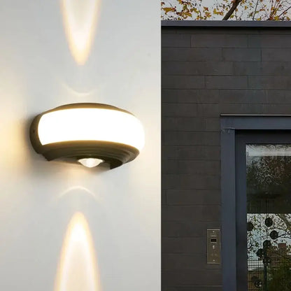 Modern black decorbites led wall sconce with curved design and frosted glass diffuser for staircase and balcony lighting