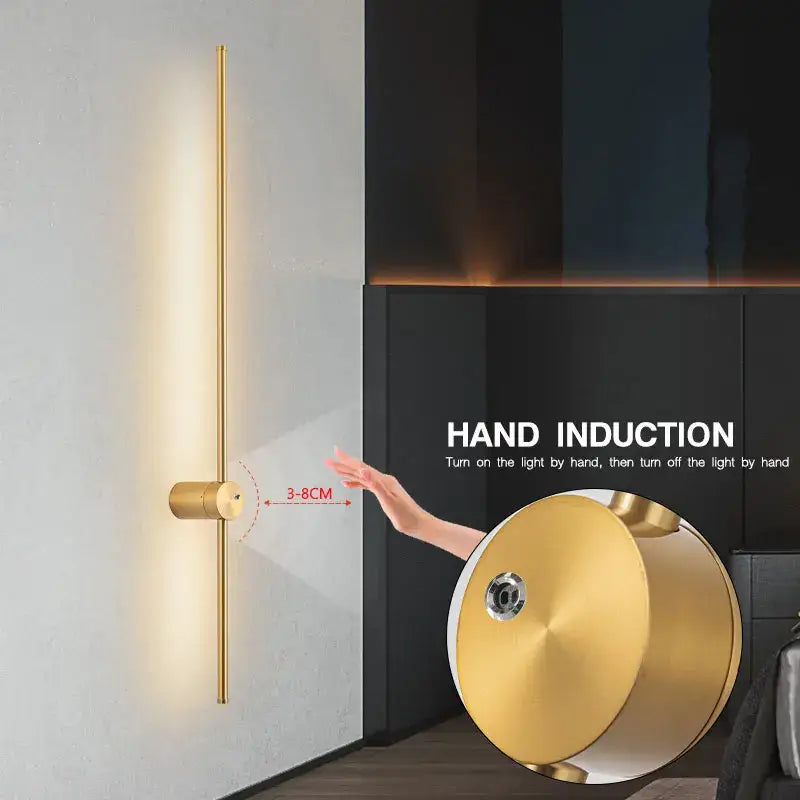 Gold-colored minimalist decorbites led hand induction wall light with sleek vertical bar and circular base for corridors and bedrooms