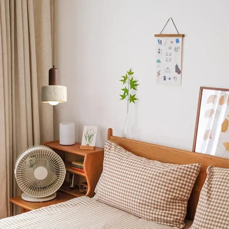 Beige and white checkered pillow on wooden bed frame beside decorbites led hanging lamp for kitchen and living room lighting