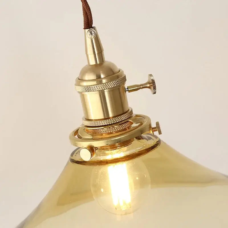 Brass-finished decorbites led hanging lamp with amber glass shade and edison bulb for modern living room lighting