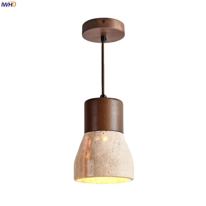 A rustic decorbites led hanging lamp with dark wood stem and textured yellow travertine concrete shade for warm lighting