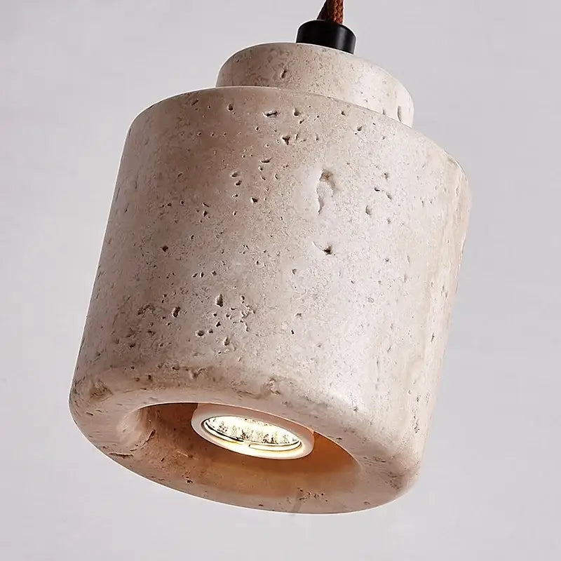 Beige textured concrete pendant light with visible led bulb in decorbites led hanging yellow travertine adjustable fixture