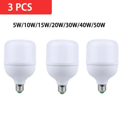 Three white decorbites led highlight lamps with frosted plastic bodies and metallic screw bases for home decor