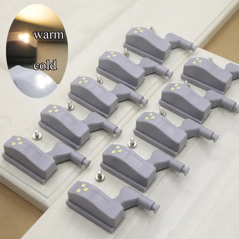 Gray plastic decorbites led hinge sensor lights with four yellow leds for cabinet wardrobe kitchen closet use