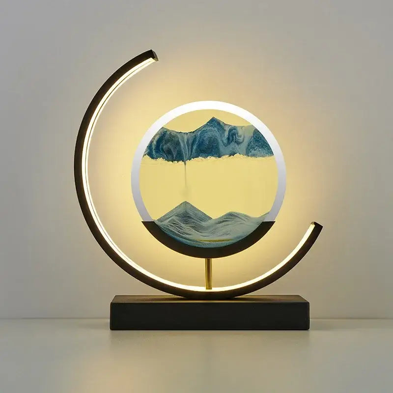 Modern crescent-shaped decorbites led hourglass quicksand desk lamp with glowing frame and blue beige sand art mountains