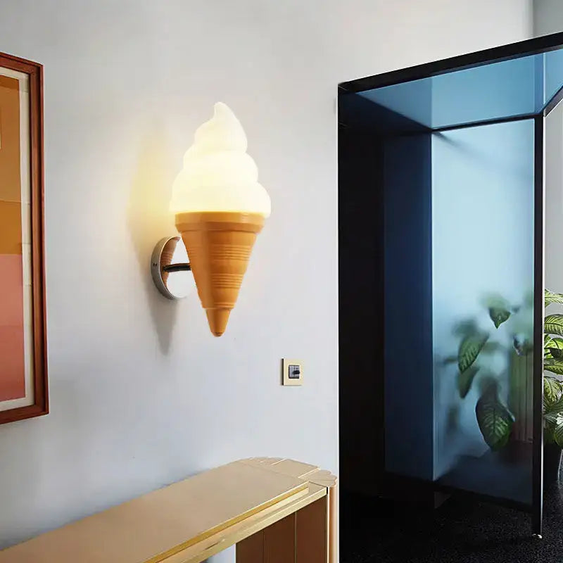 Decorbites led ice cream wall lamp with glowing white topping and textured golden waffle cone base for modern lighting