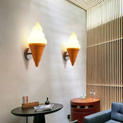 Decorbites led ice cream wall lamp with golden-brown textured cone and warm yellow light for children’s bedroom lighting