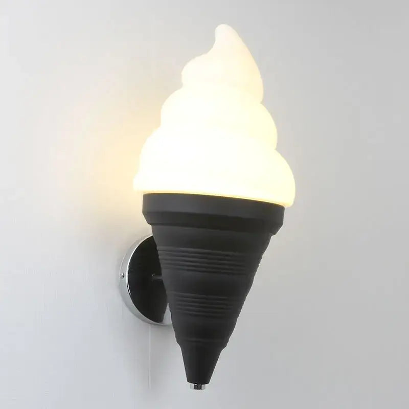 Black ice cream cone-shaped wall lamp with glowing white swirled top decorbites led ice for modern kitchen lighting