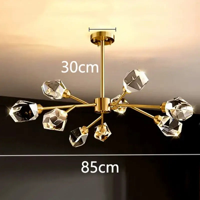 Gold-toned DecorBites LED indoor chandelier lighting with faceted crystal orbs for living room bedroom and dining room use