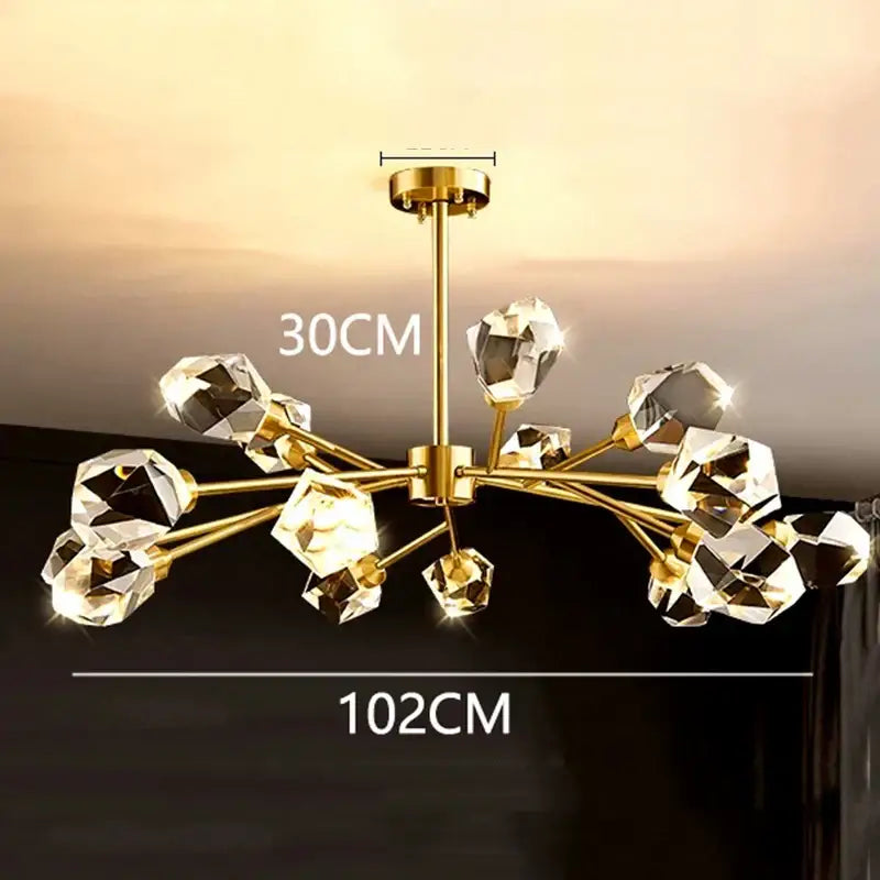 Gold-toned DecorBites led indoor chandelier lighting with faceted crystal orbs for living room bedroom and dining room use