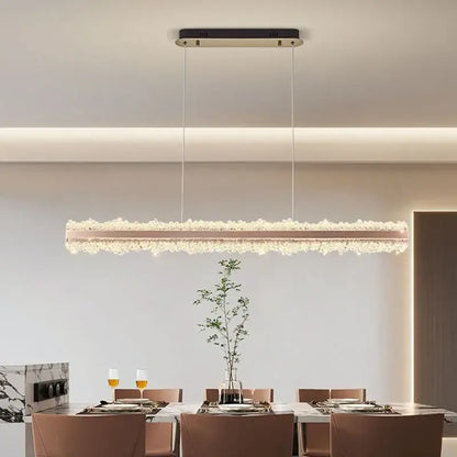 A modern decorbites led indoor chandelier lighting featuring a rose gold frame with cascading crystals for stylish bedrooms