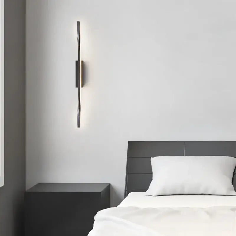 Modern black wall lamp with twisted copper design and warm ambient lighting by decorbites led indoor for outdoor decor