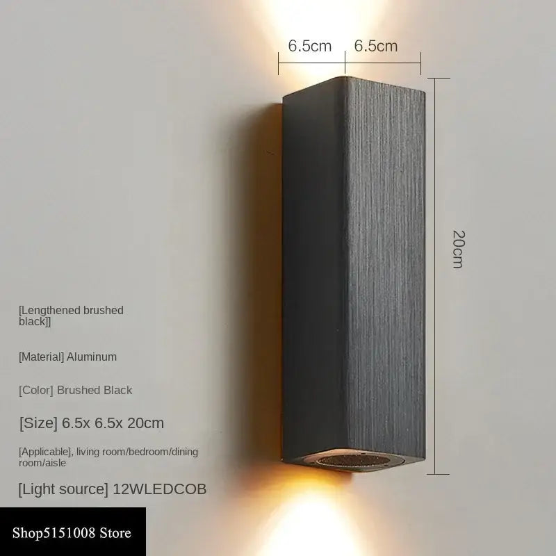 A sleek brushed black aluminum decorbites led indoor wall lamp with modern rectangular design and warm led illumination