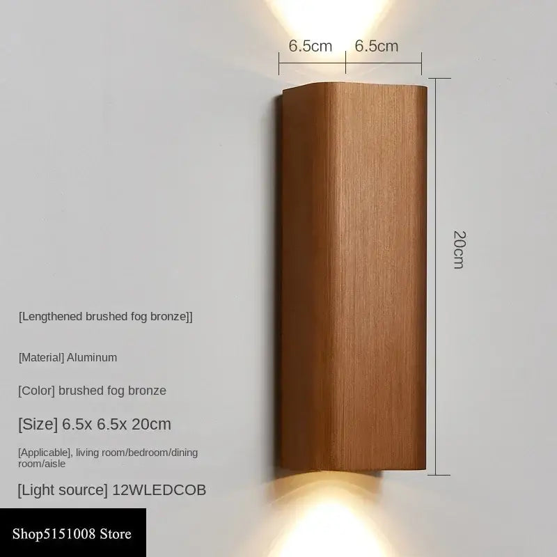A sleek brushed fog bronze aluminum decorbites led indoor wall lamp with warm led lighting for corridor and bedroom use