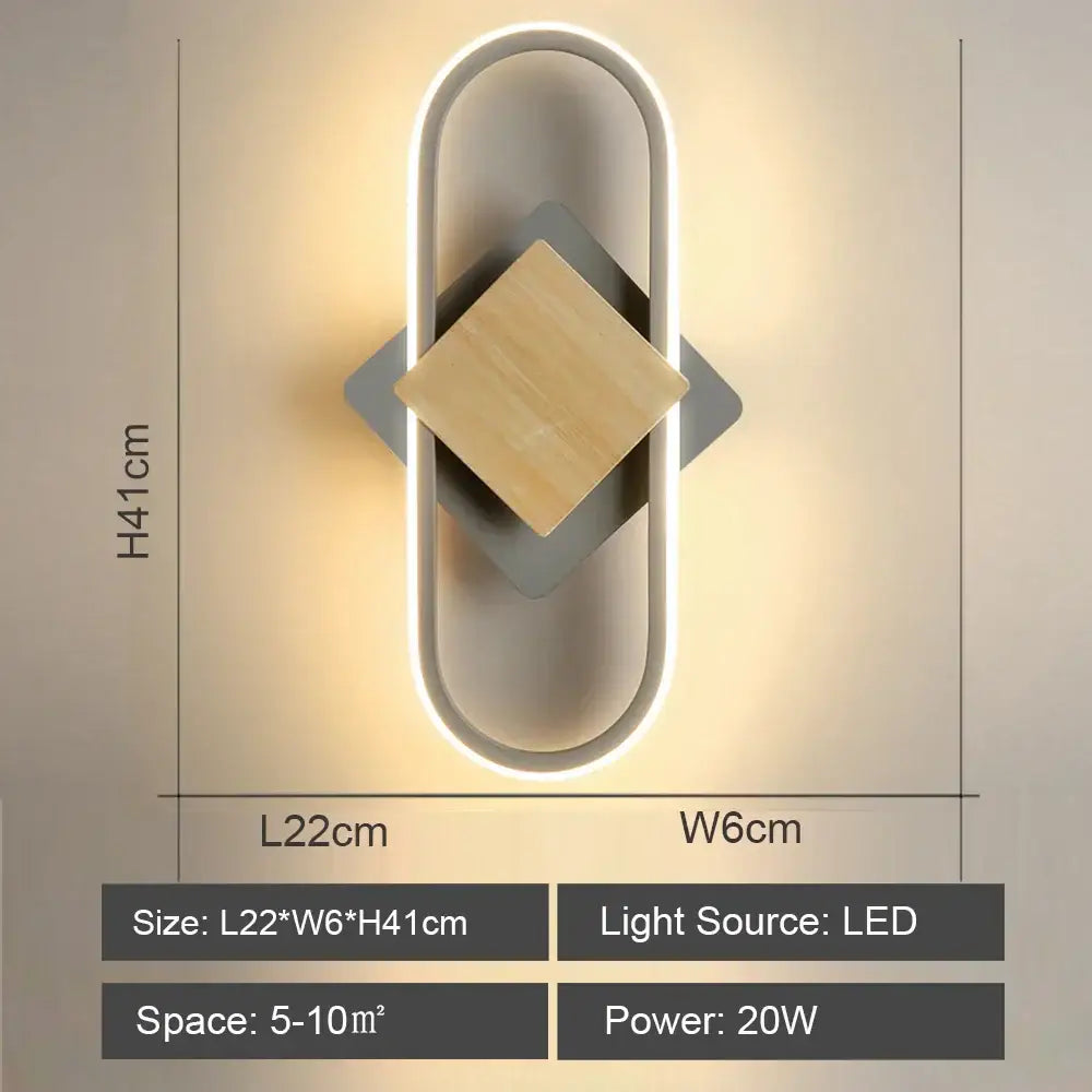 Modern minimalist decorbites led indoor wall light with a white oval frame, gray geometric base, and natural wood accent