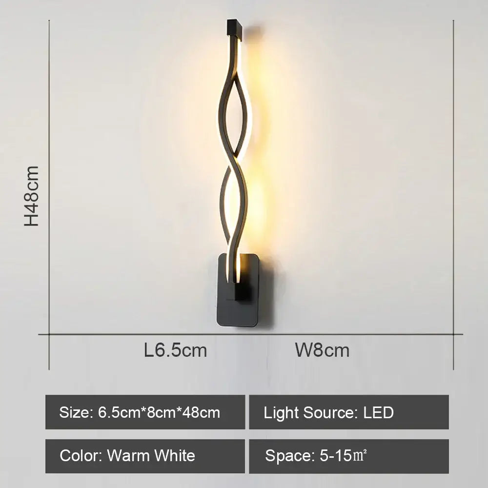 Modern black metal decorbites led indoor wall light with twisted design emitting warm white led light for home lighting