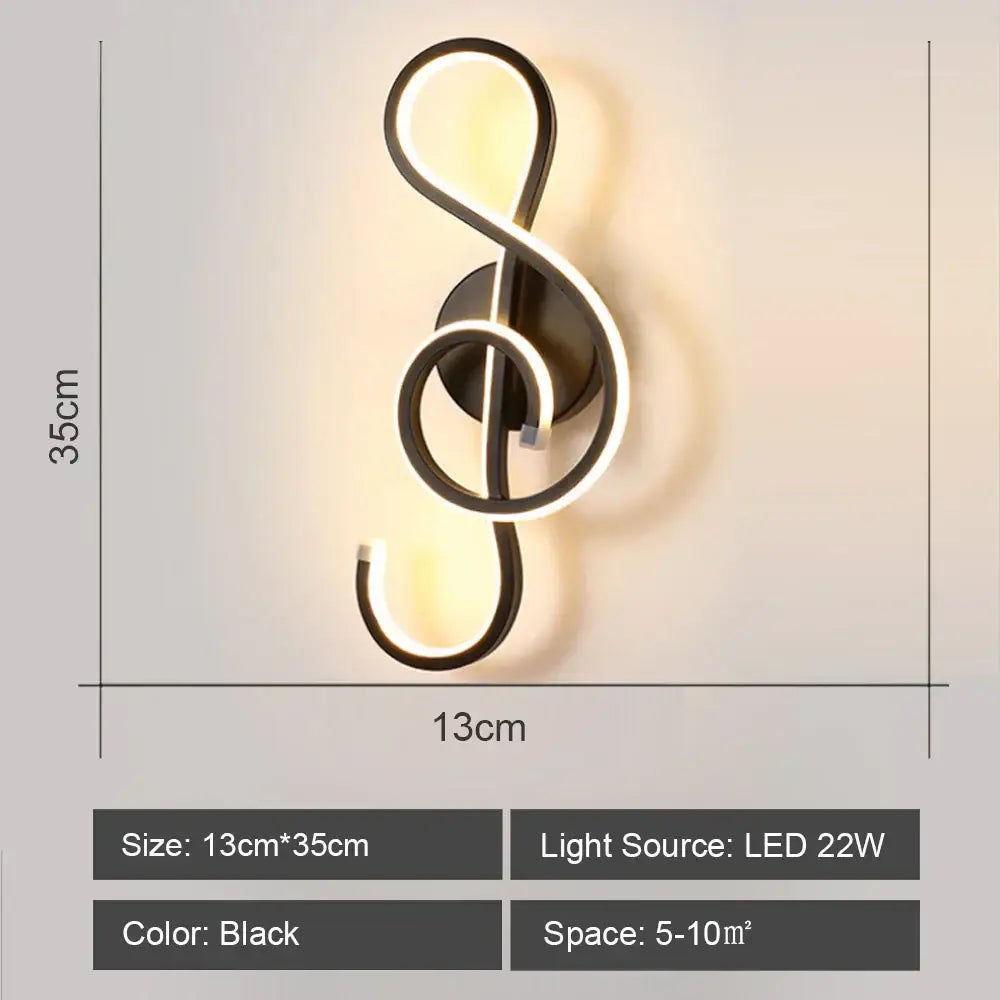 Black DecorBites™ LED indoor wall light shaped like a treble clef for modern home lighting