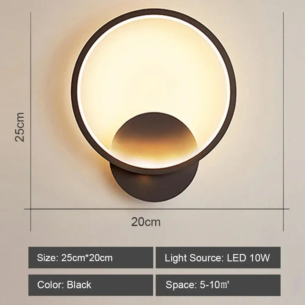 Black circular decorbites led indoor wall light with modern matte finish and warm glow for home lighting