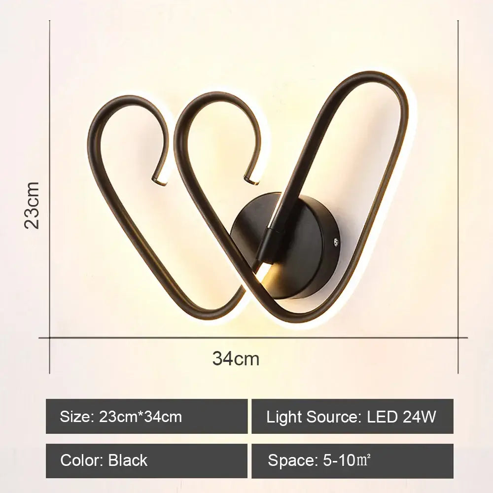 Black decorbites led indoor wall light with sleek curved design and energy-efficient led lighting for modern home decor