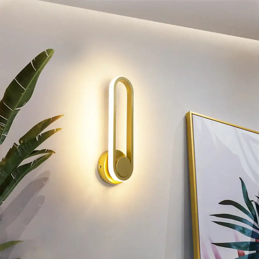Gold-finished decorbites led indoor wall lamp with sleek curved design and integrated led lighting for home use