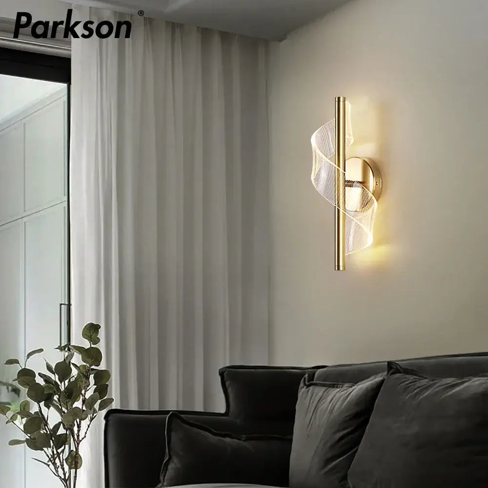 Gold-toned decorbites led wall sconce light with sleek twisted mesh design for warm indoor living room decor