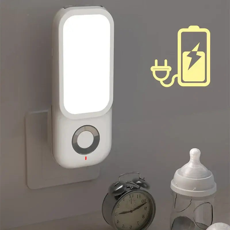 White rectangular decorbites led induction night light with circular control button red indicator plugged into outlet