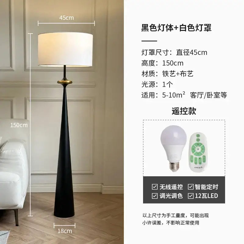 Decorbites led iron art floor lamp with sleek black iron base white fabric shade and gold-toned accent ring