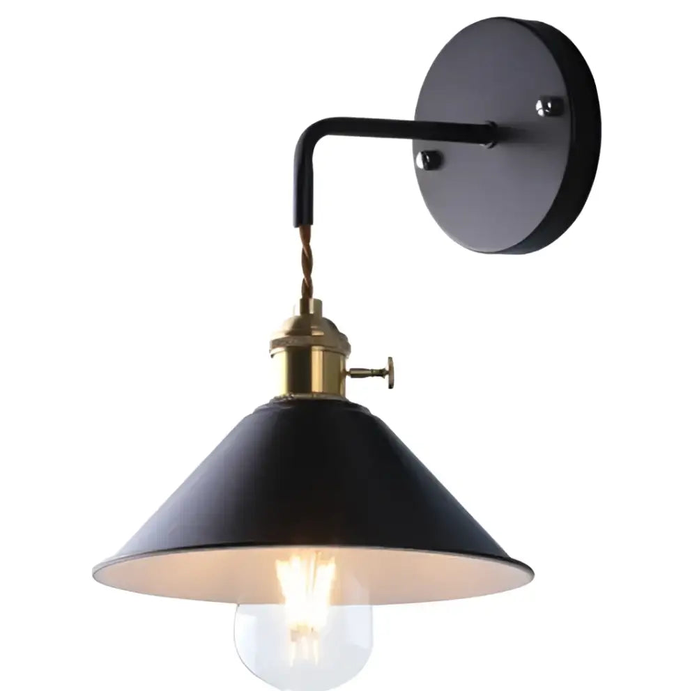Black metal wall light with brass base and exposed bulb featuring decorbites led iron art design for modern home decor