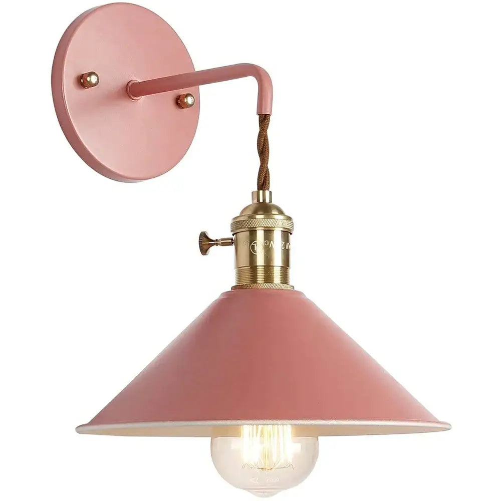 Pink metal wall light with brass-finished socket and twisted brown cord by DecorBites LED iron art for modern decor