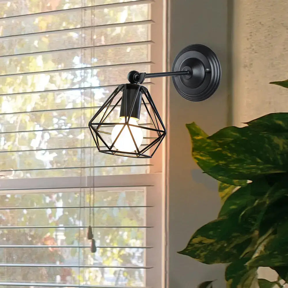 Black geometric wireframe wall light with warm glowing bulb decorbites led iron cage for home bedroom kitchen decor