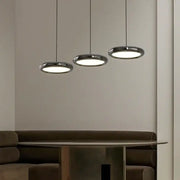 Three sleek decorbites led iron pendant lights with polished chrome finish and circular illuminated glass shades for home decor
