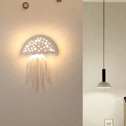 White decorbites led jellyfish wall lamp with perforated dome and flowing tentacles for modern indoor decor