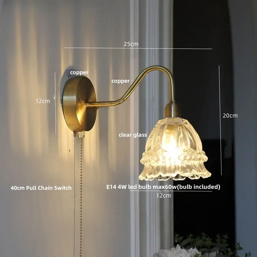 Antique brass wall lamp with clear fluted glass shade and e14 led bulb in decorbites led jellyfish wall design