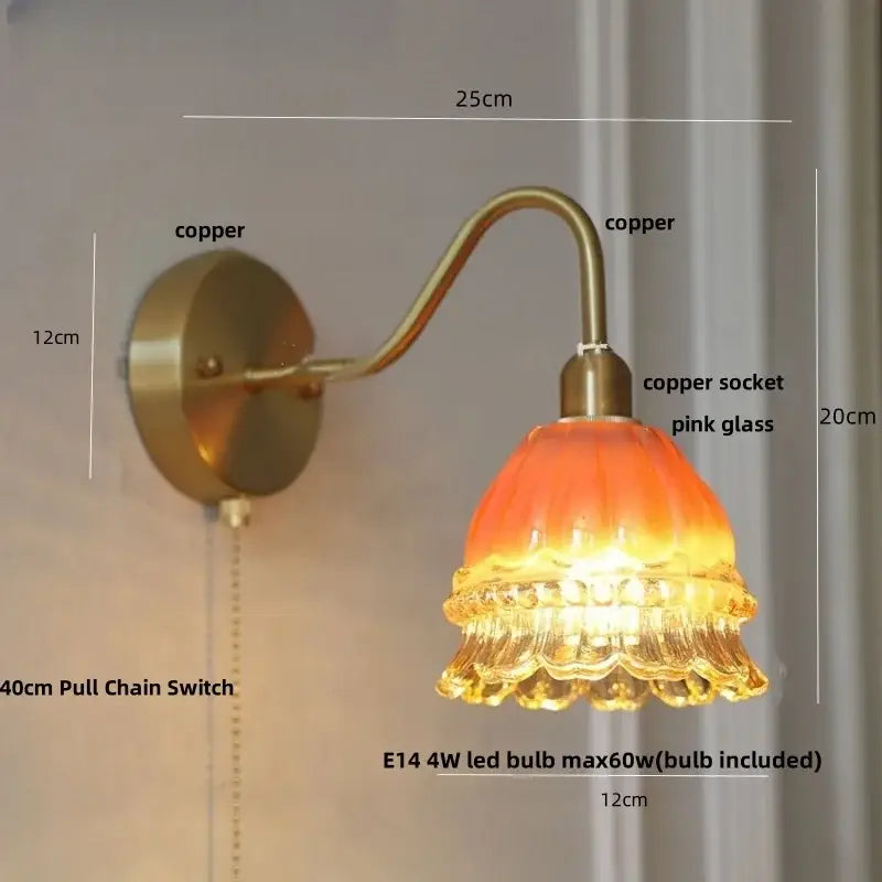 Vintage-style decorbites led jellyfish wall lamp with copper metal arm and ornate pink glass shade with pull chain switch