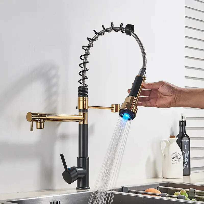 Gold and black decorbites led kitchen faucet with flexible coiled hose and illuminated blue spray head for vessel sink