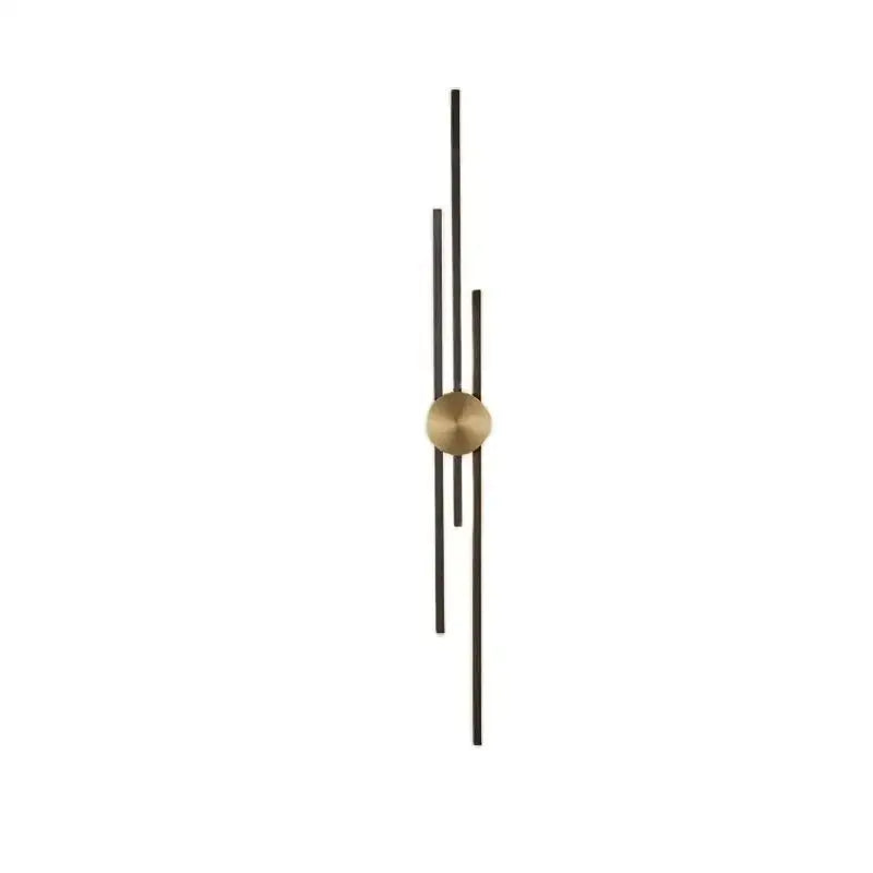 Minimalist wall clock with slender black rods and gold-toned face paired with decorbites led long wall lamp for modern spaces