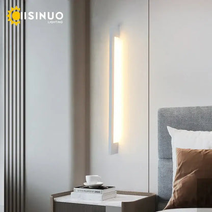 A sleek decorbites led long wall lamp with slim rectangular design and warm white illumination for modern interiors