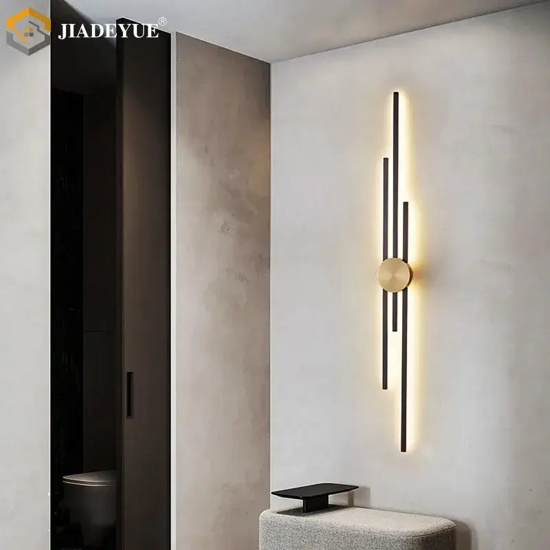 Decorbites led long wall lamp with black vertical bars and gold circle emits warm light for living room and bedroom decor