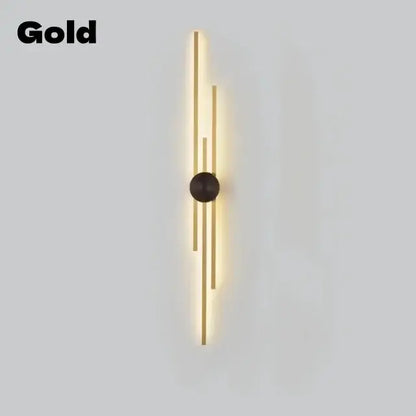 Gold-colored DecorBites™ LED long wall lamp with slender vertical bars and central dark accent for modern wall lamp décor
