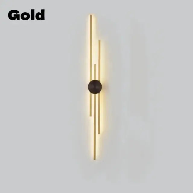 Gold-colored DecorBites™ LED long wall lamp with slender vertical bars and central dark accent for modern wall lamp décor