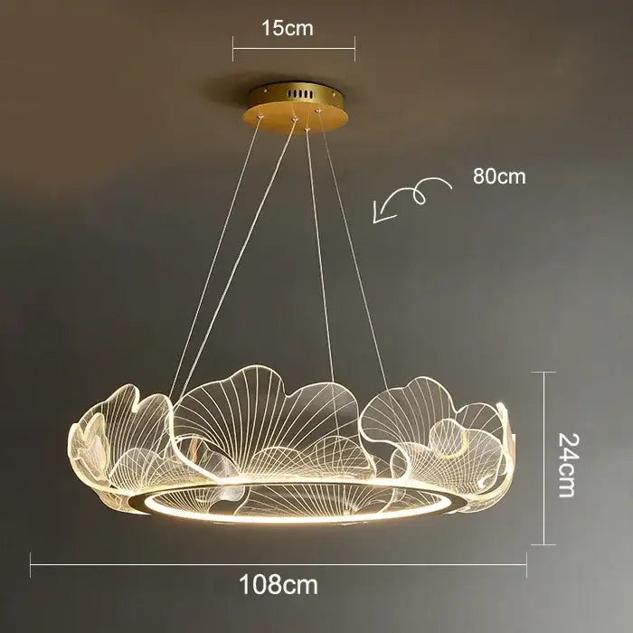 A decorbites led lotus circular pendant light with gold mount and translucent lotus leaf acrylic rings emitting warm glow