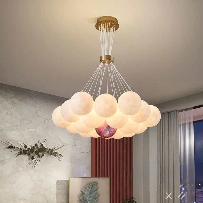 Cloud-shaped decorbites led lunar chandelier with frosted white bulbs and gold metal fixture for home decor