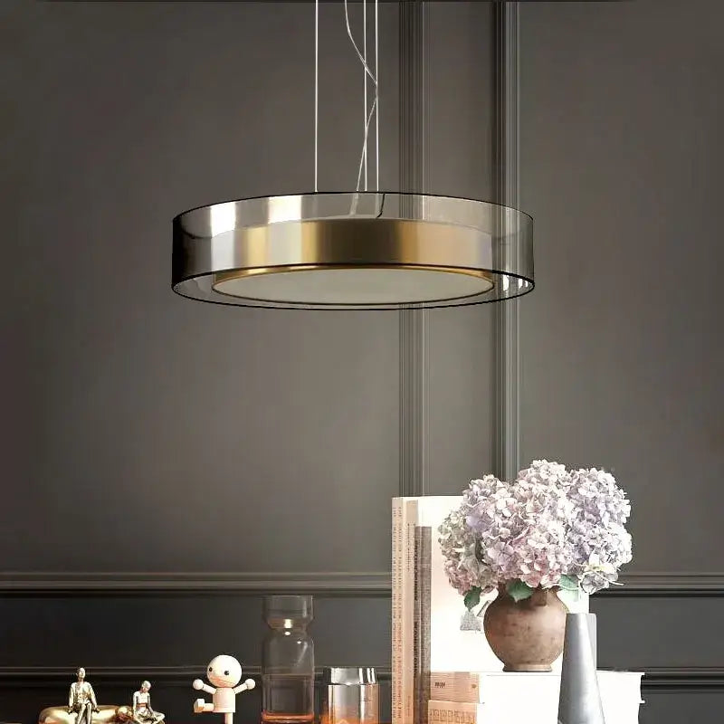 Modern circular pendant light with metallic frame and glass panels in decorbites led luxury chandelier for minimalist decor
