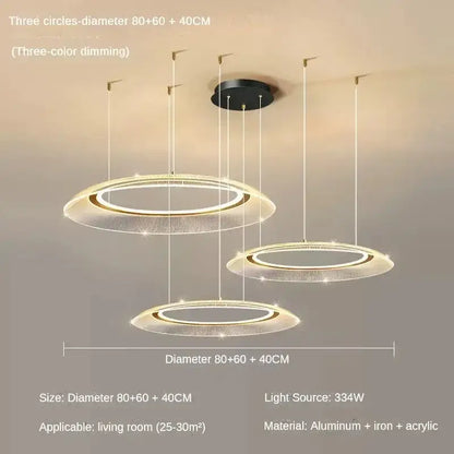 Modern three-tiered decorbites led luxury ring chandelier with translucent acrylic rings and gold-toned accents for living rooms